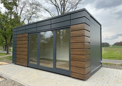 Portable Office 600cm x 300cm (10ft x20ft) – Model 3 – Steel frame 100x100x3 mm; Galvanized external walls in wood color; roof, walls and floor insulated with 100mm Styrofoam; Aluminum double glazed: door, Aluminum opening window and 2 pcs Aluminum fix windows; electrical installation, wall mounted electric heater